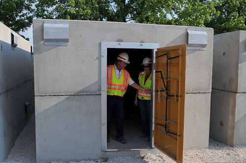 A storm shelter is being inspected